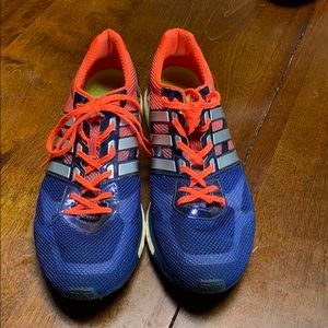 12.5 navy and orange adidas adios boost shoes.